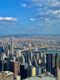 Aerial view of cityscape against sky