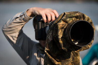 Close-up of photographer photographing