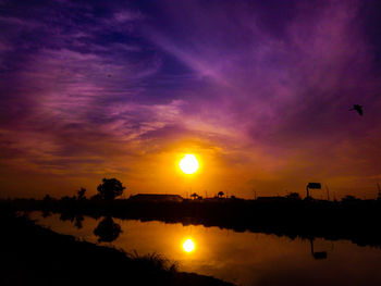 Scenic view of silhouette landscape against sky during sunset