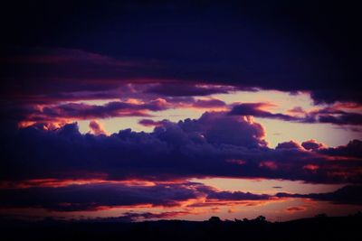 Scenic view of landscape against cloudy sky