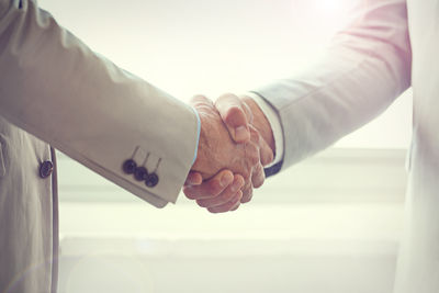 Cropped image of business colleagues shaking hands