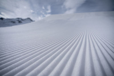 Full frame shot of snow covered sand