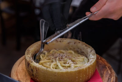 Midsection of man preparing food