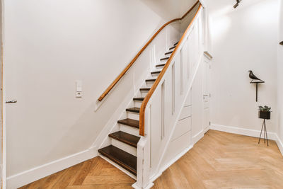 White wooden staircase in building