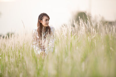 Full length of woman on field