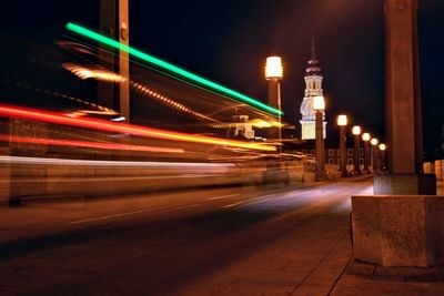 Light trails on illuminated city at night