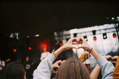 Rear view of people at music concert