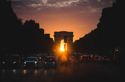 Silhouette of city during sunset