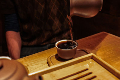 Close-up of coffee cup on table