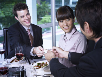 Colleagues at restaurant during meeting