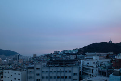 Cityscape against sky at night