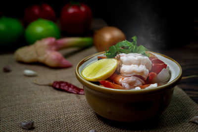 Close-up of fruits in bowl on table