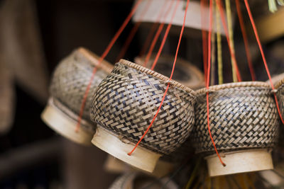 Close-up of clothes hanging on metal at home