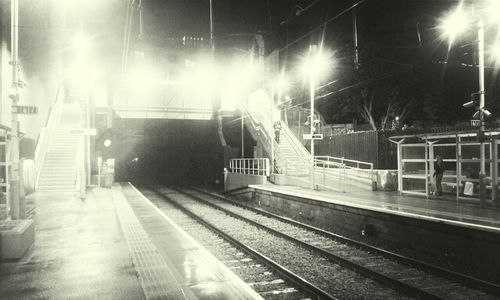 Railroad tracks at night