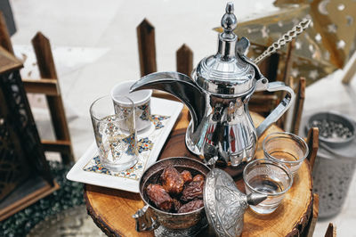 High angle view of dates and coffee on table