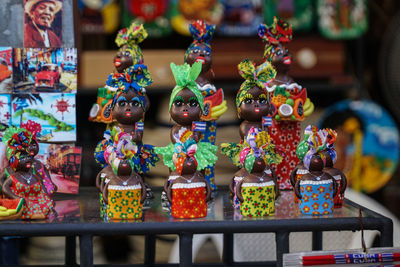 Close-up of toys for sale at market stall