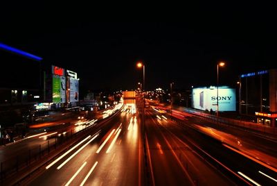 Traffic on city street at night