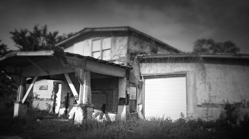 Abandoned house against sky