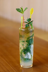 Close-up of mojito on wooden table