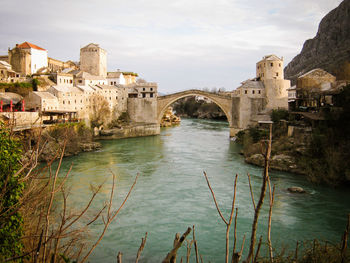 Arch bridge over river