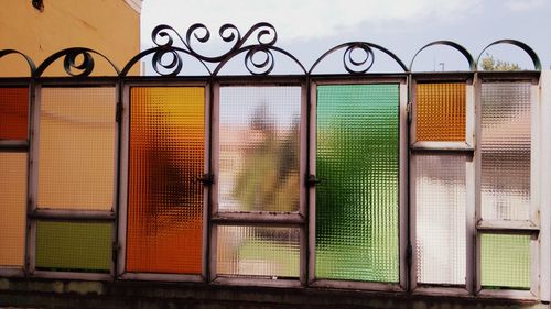 Close-up of stained glass against the sky