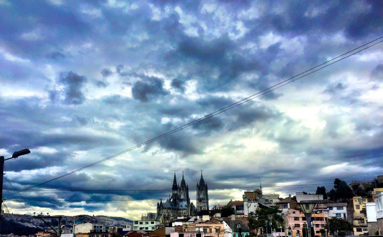 building exterior, architecture, built structure, sky, cloud - sky, cityscape, city, cloudy, residential district, crowded, residential building, cloud, residential structure, weather, high angle view, city life, town, travel destinations, outdoors, dusk