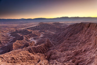 Scenic view of dramatic landscape against sky