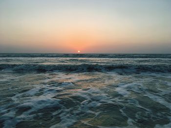 Scenic view of sea against sky during sunset