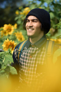 Portrait of smiling young woman outdoors