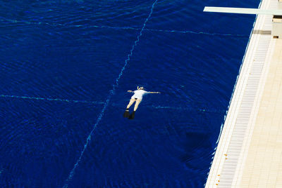 High angle view of person swimming in pool