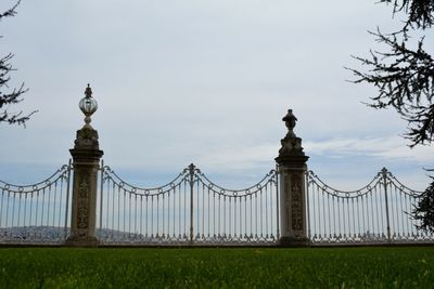 View of bridge against cloudy sky