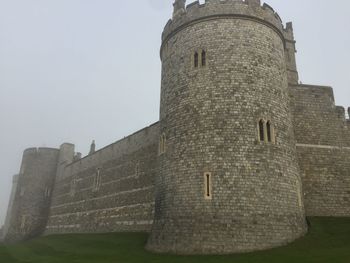 Low angle view of old building against sky