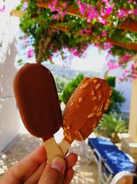 Midsection of person holding ice cream