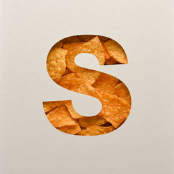 High angle view of bread against white background