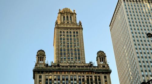 Low angle view of historical building against blue sky