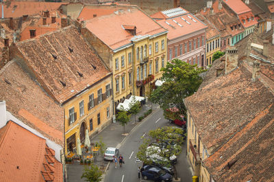 High angle view of street amidst buildings in city
