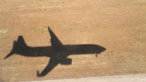 High angle view of airplane flying