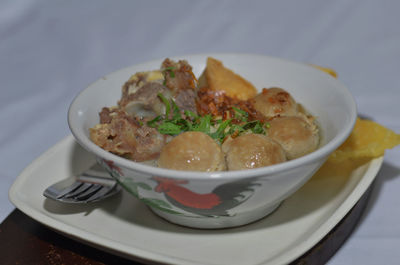 Close-up of soup in bowl on table