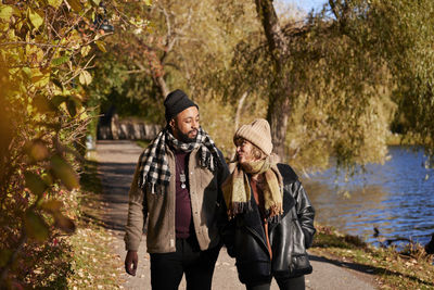 Couple walking in autumn park