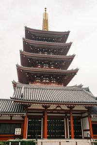 Low angle view of pagoda against sky