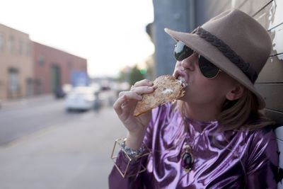 Full length of boy eating food
