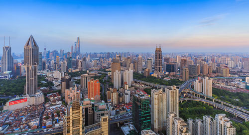 High angle view of cityscape against sky during sunset