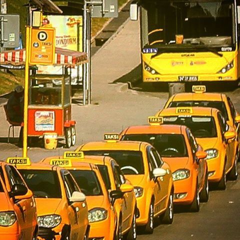 transportation, yellow, mode of transport, land vehicle, public transportation, text, communication, in a row, travel, car, western script, train - vehicle, outdoors, no people, street, information sign, journey, guidance, sign, rail transportation