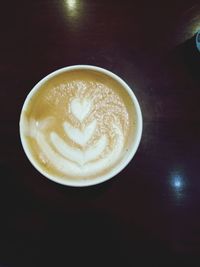 Close-up of cappuccino on table