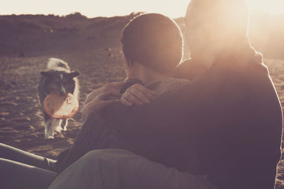 Man and son on land