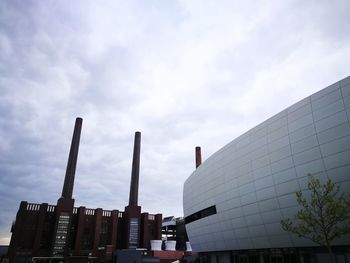 Low angle view of modern buildings against sky