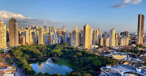 Panoramic view of buildings in city against sky