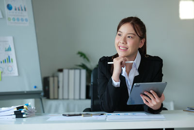 Businesswoman working at office