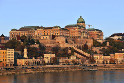Buda castle palace view on danube river at sunrise, hungary, budapest