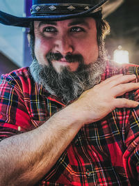 Portrait of man wearing hat